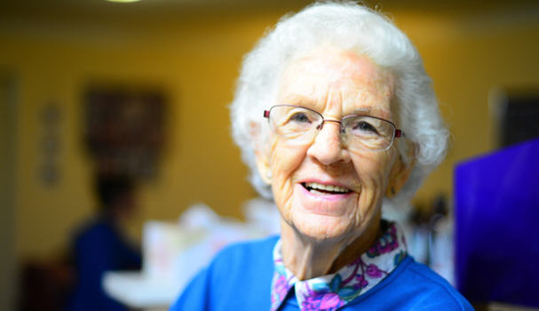 photo of white-haired, pleasant-faced woman smiling