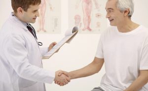 Doctor teaching patient stroke facts